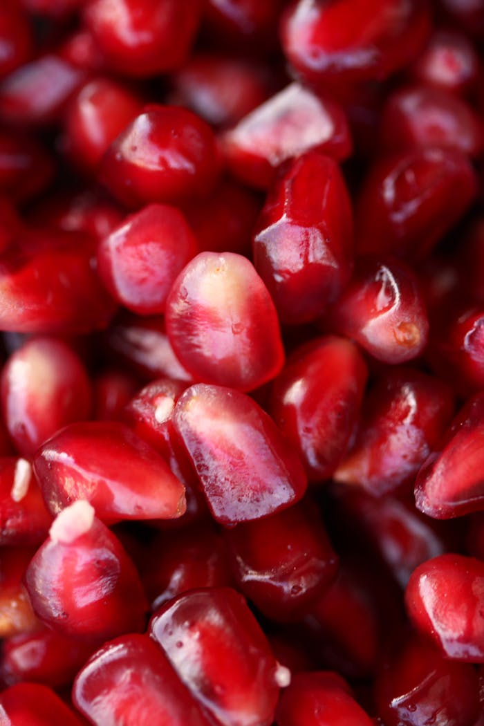 why-choose-us-02 Explore the refreshing and healthy red pomegranate seeds with this vibrant close-up view.